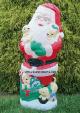 Santa with Four Puppy Dogs
